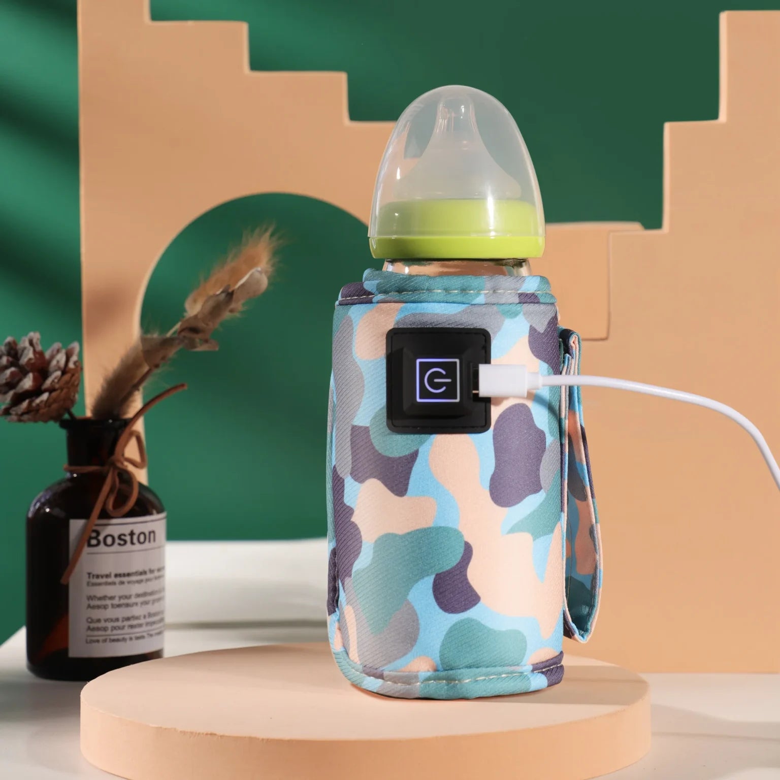 Chauffe-biberon portable sous forme de pochette isolante chauffante